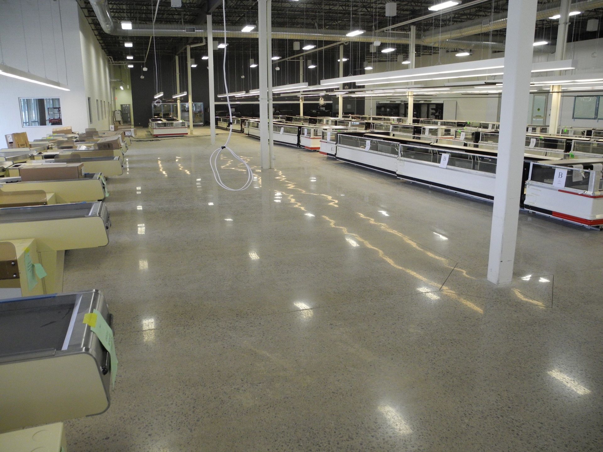 A large room with a lot of counters and tables