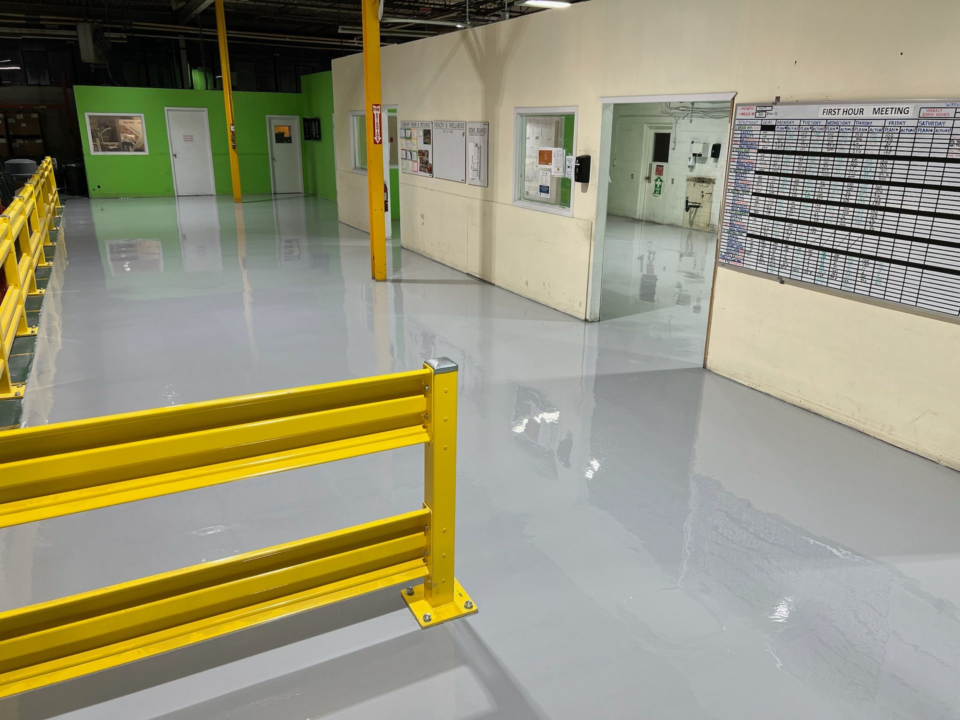 There is a yellow fence in the middle of the room.