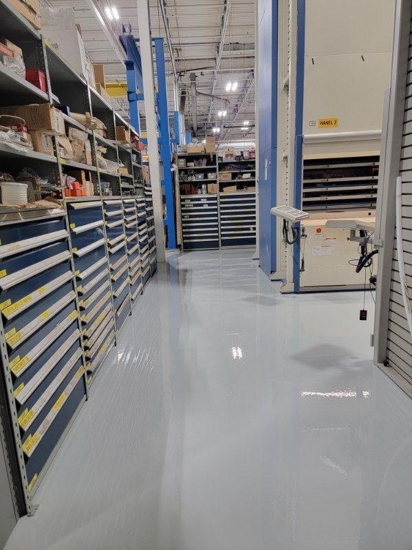 A warehouse filled with lots of shelves and drawers.