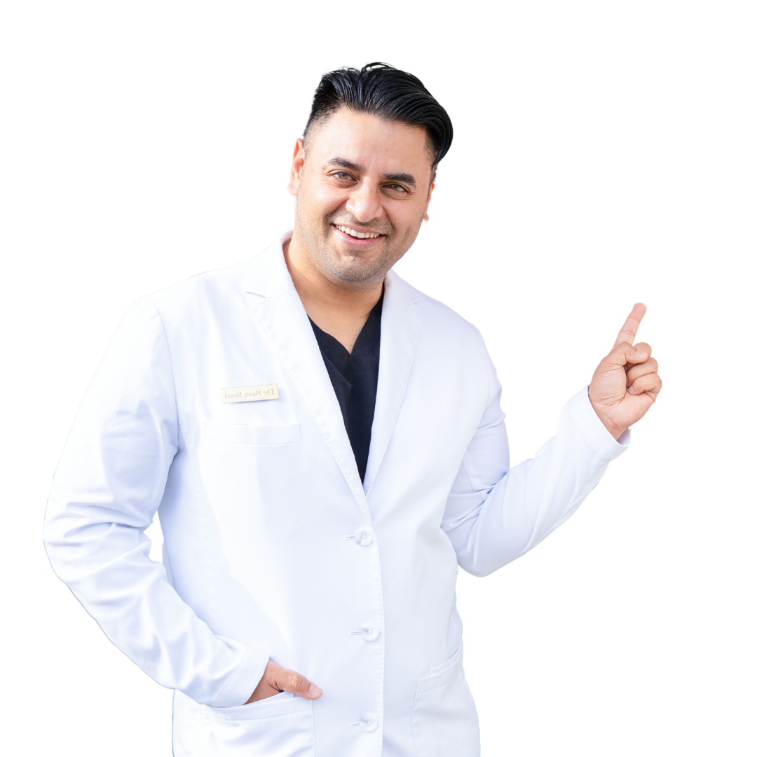 A man with a beard is smiling and giving a thumbs up