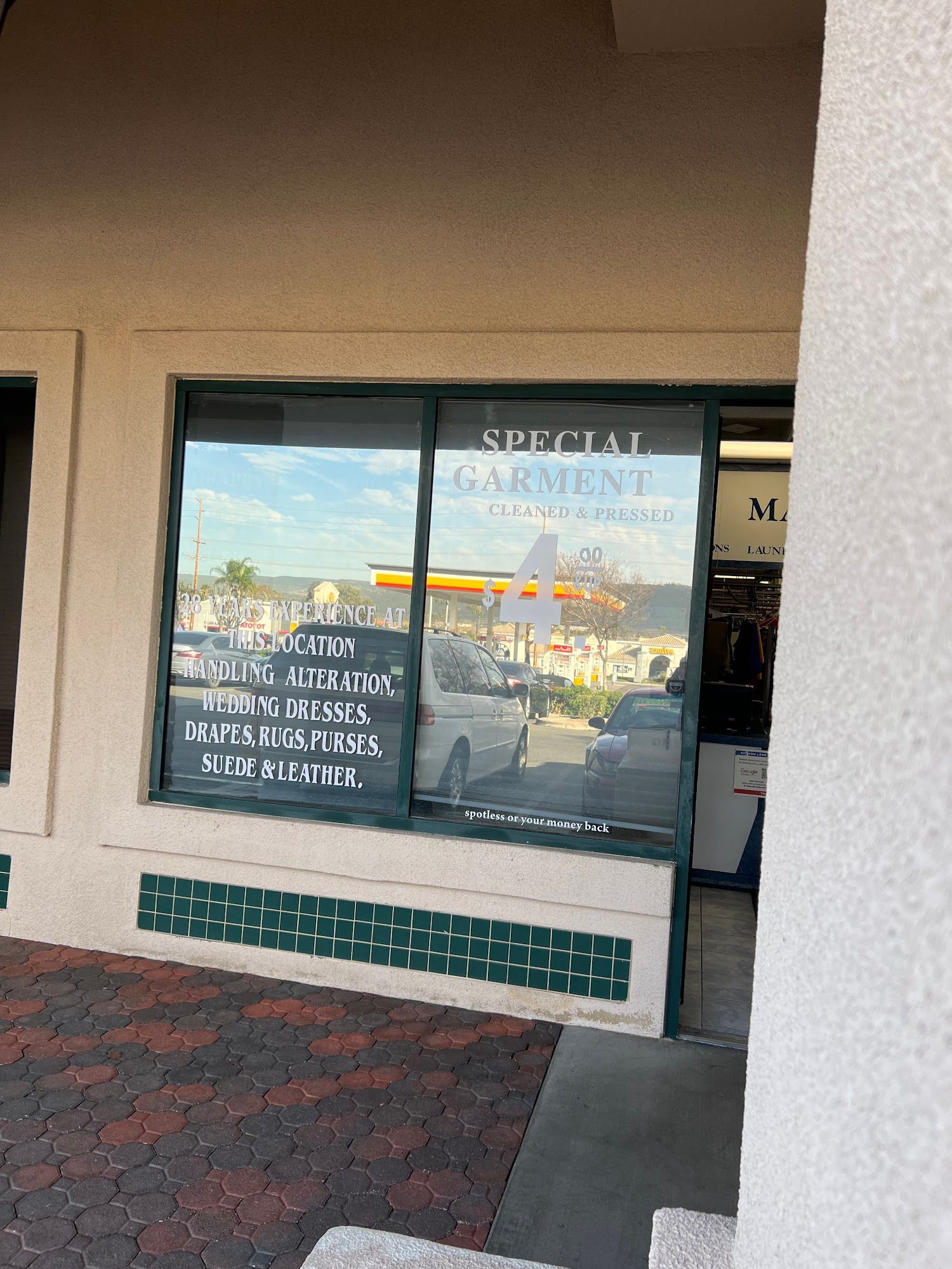 The inside of a moving truck filled with boxes and blankets.