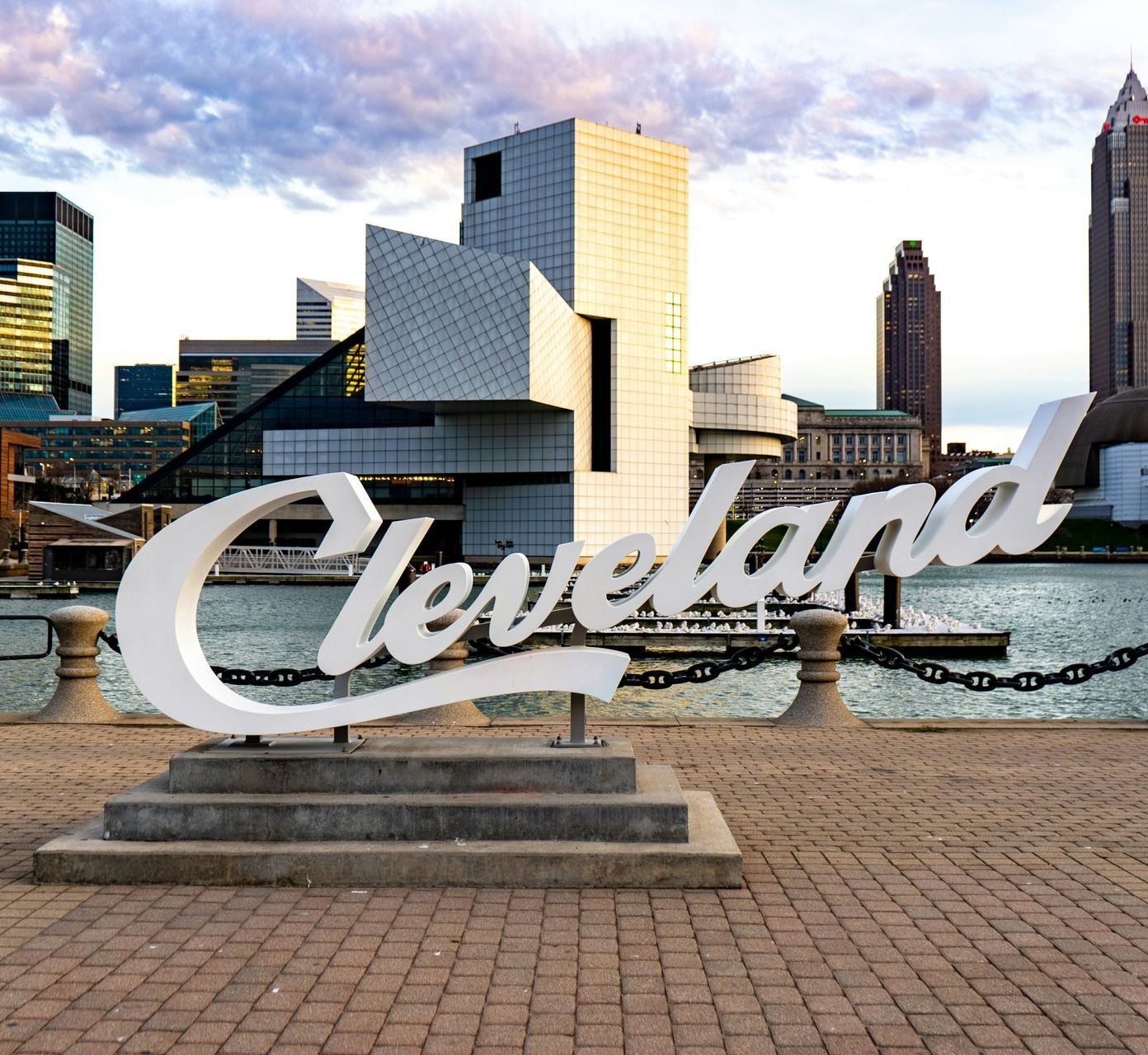 A large white sign that says cleveland on it