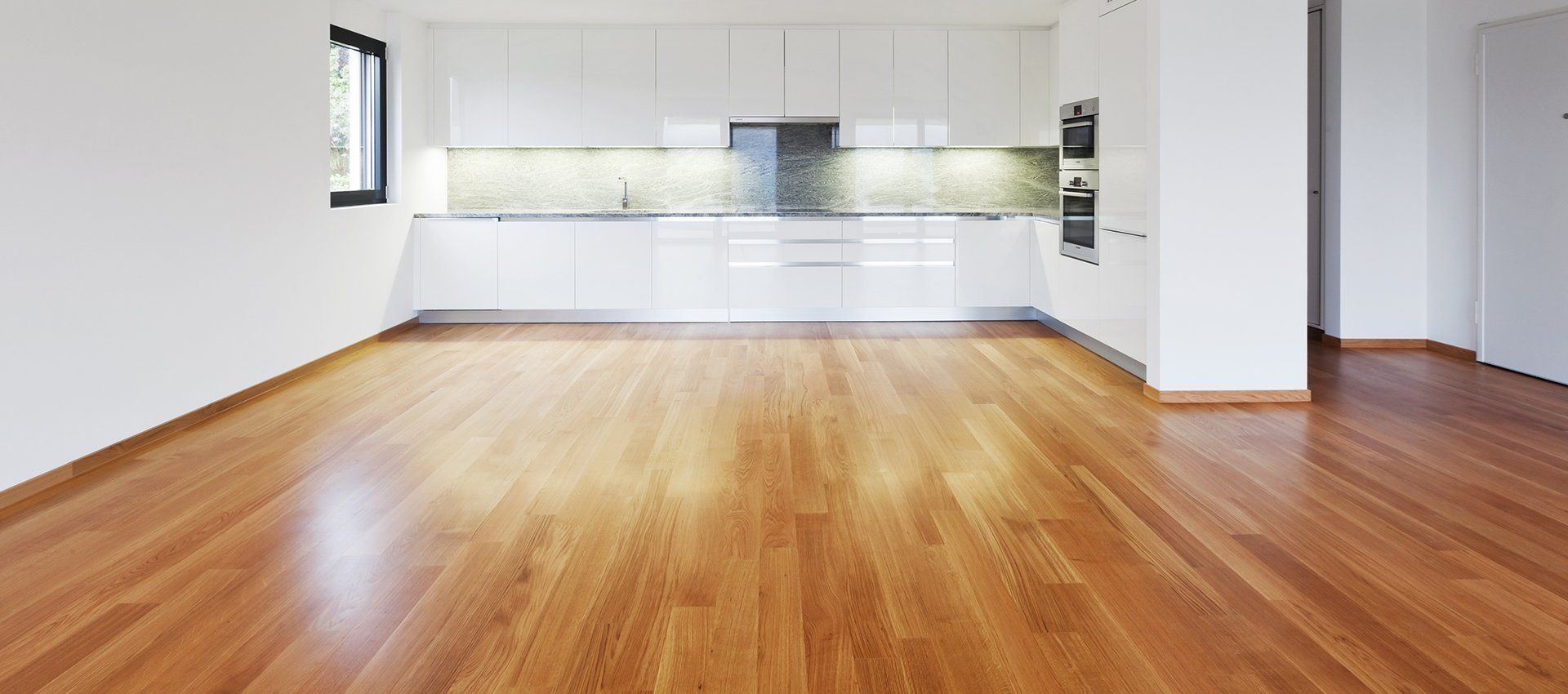 wooden flooring and skirting in kitchen