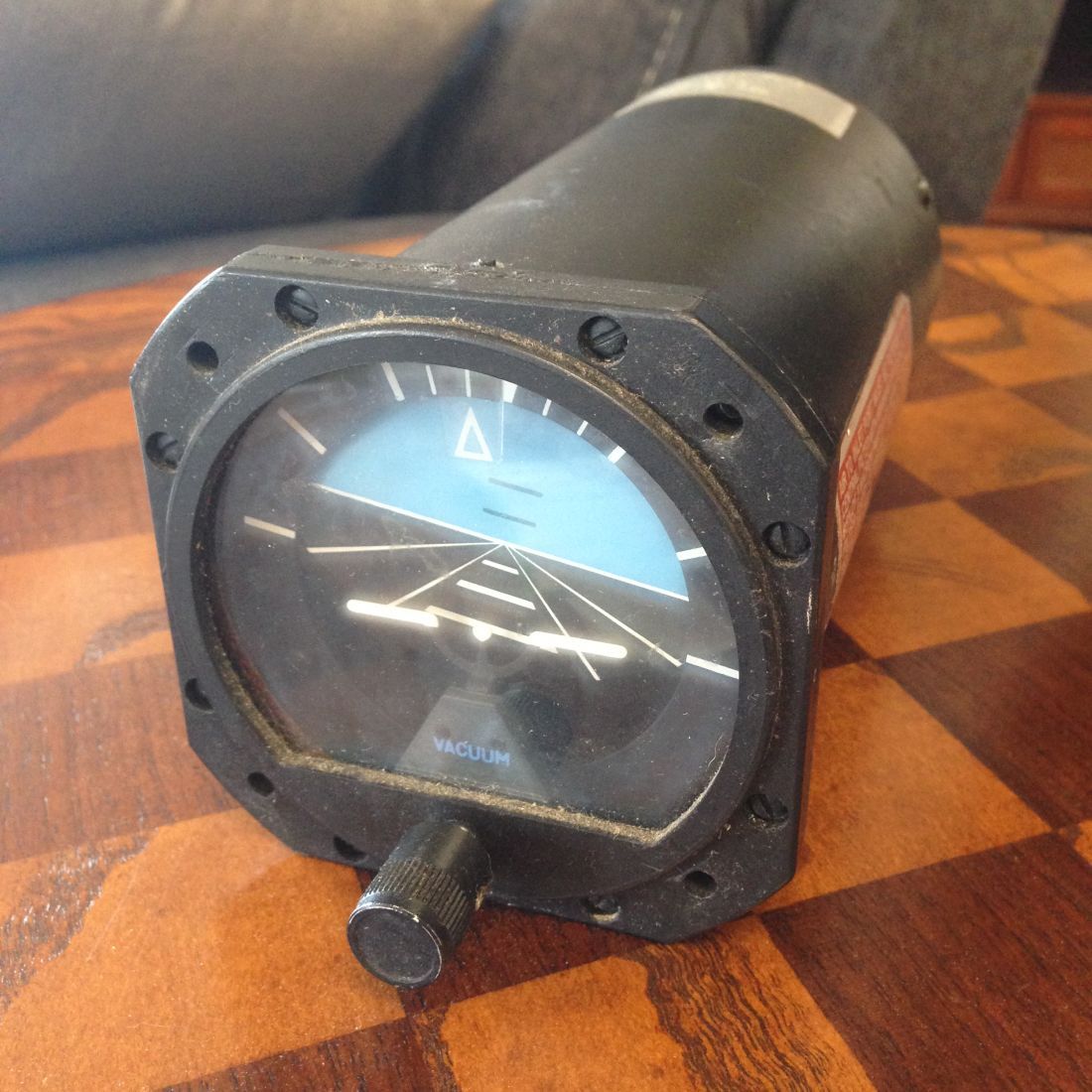 A clock that has the letter a on it