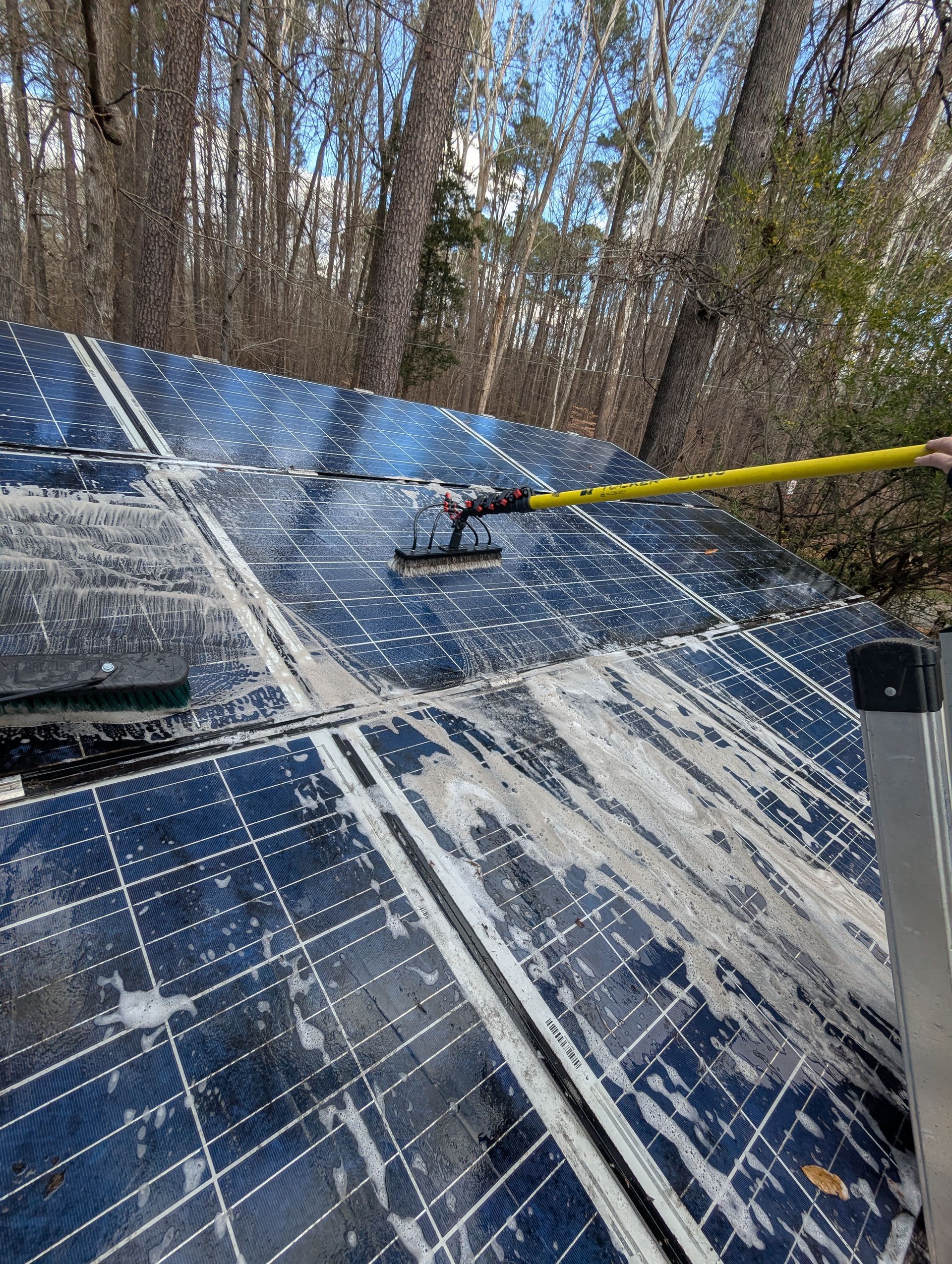 cleaning roof top solar panels