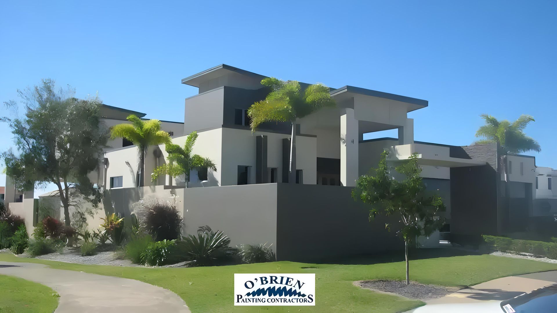 A Large House With a Sign That Says O'brien — O'Brien Painting Contractors in Mooloolaba, QLD