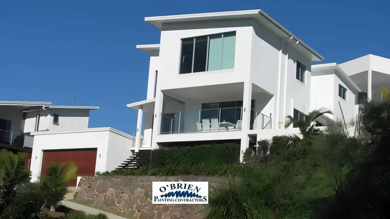 A White House With a Sign That Says 'sydney' on It — O'Brien Painting Contractors in Warana, QLD