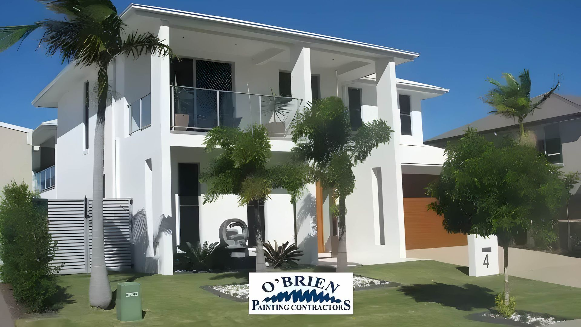 A White House With a Sign That Says O'brien Constructions — O'Brien Painting Contractors in Caloundra, QLD