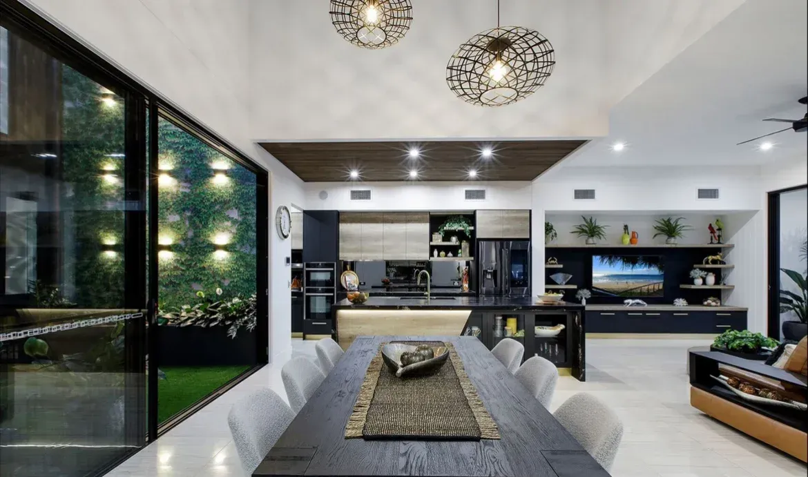 A Dining Room With a Long Table and Chairs — O'Brien Painting Contractors in Warana, QLD