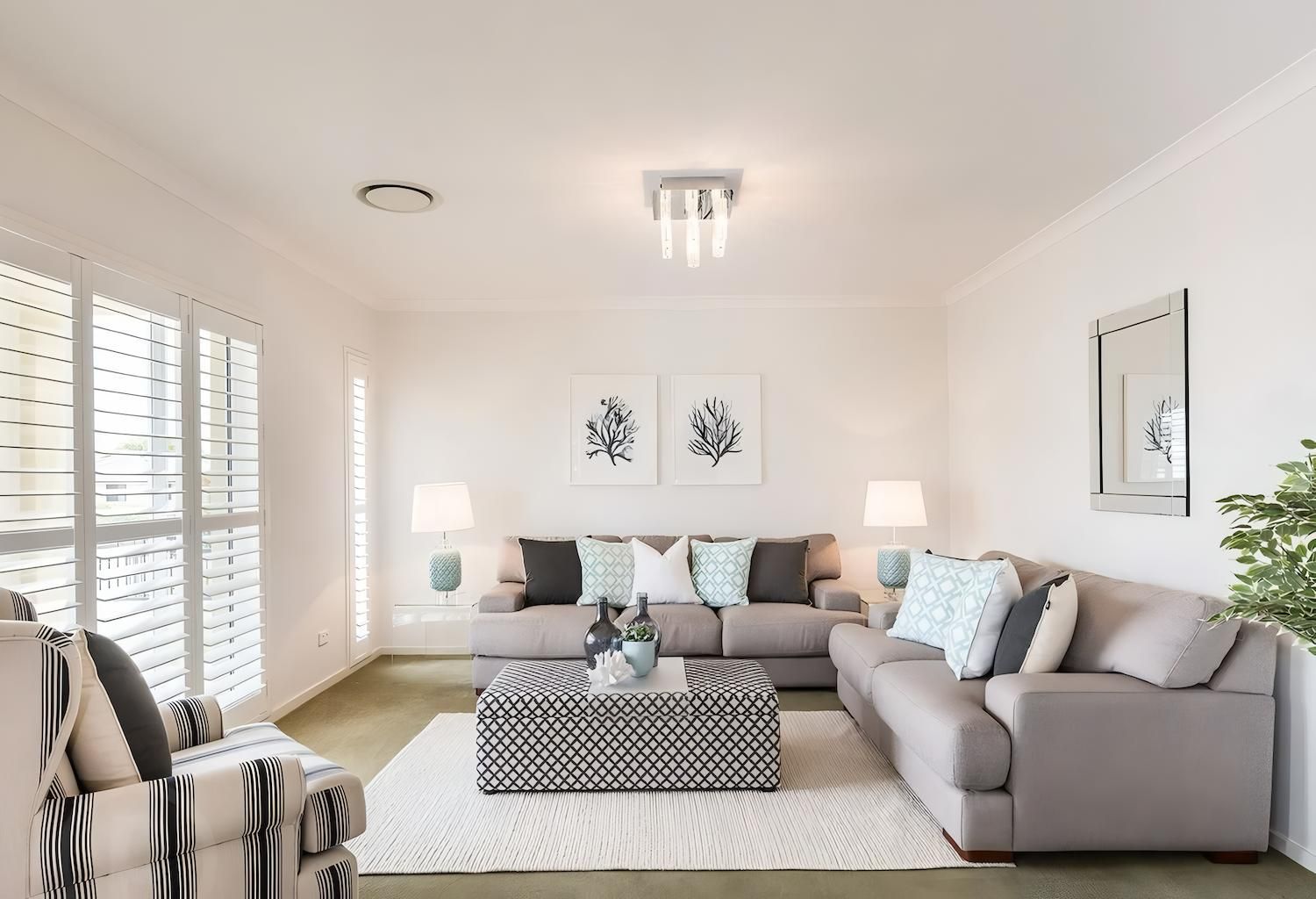 A Living Room Filled With Furniture and a Coffee Table — O'Brien Painting Contractors in Alexandra Headland, QLD