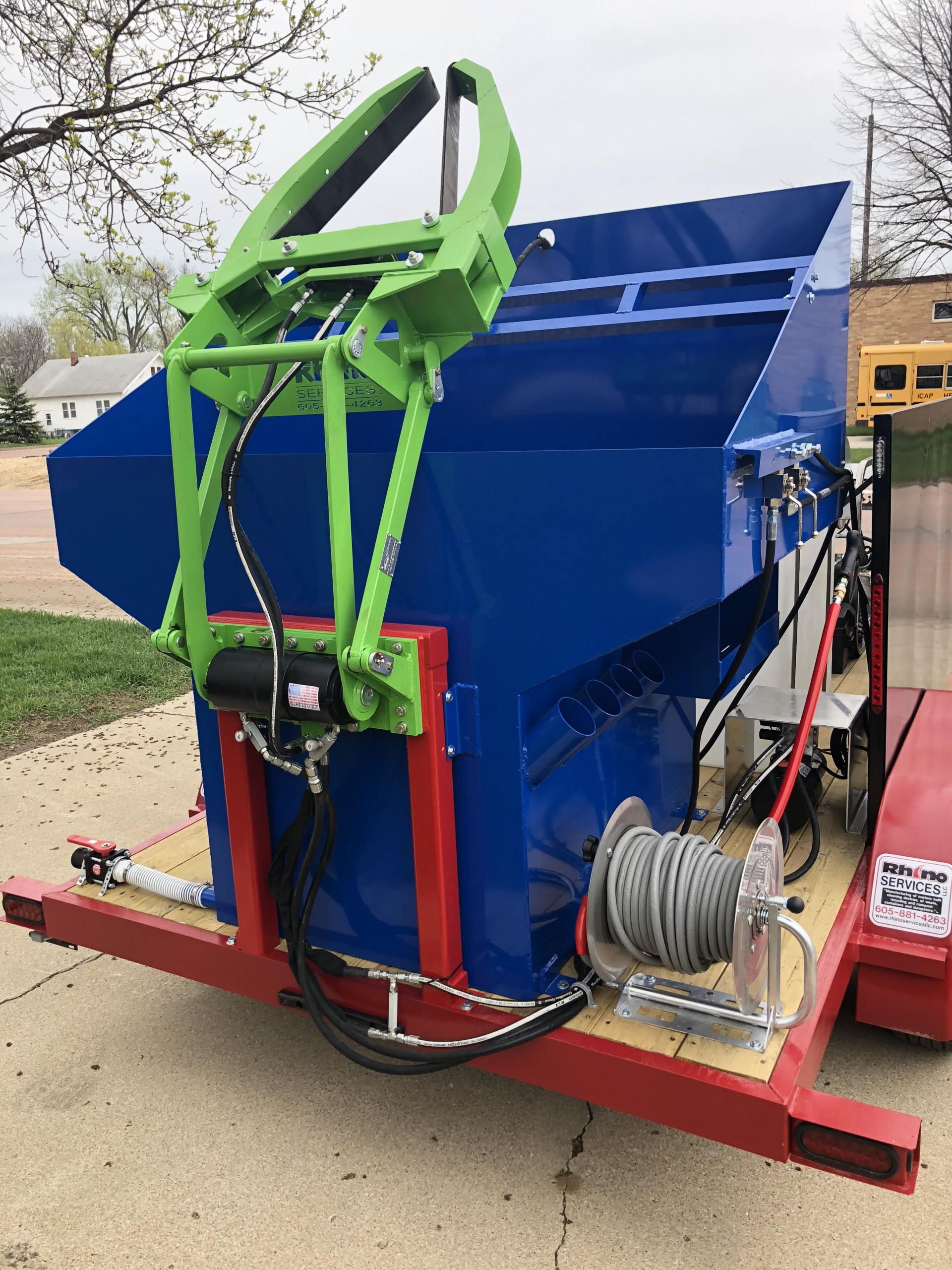 blue custom bin cleaning trailer with lime green hopper