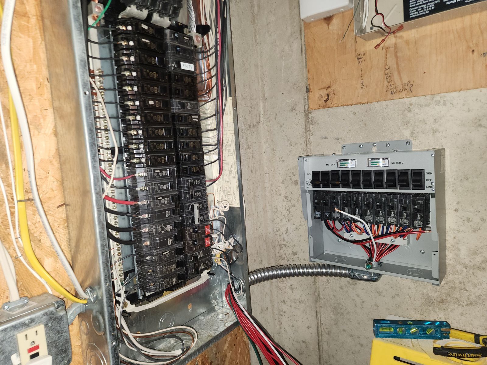 Night-lit garden with torch-style lights along a pathway, highlighting bushes and trees against a dark sky.