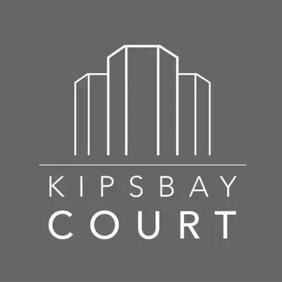A logo for kipsbay court on a gray background