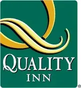 The quality inn logo is a green square with a yellow swirl.