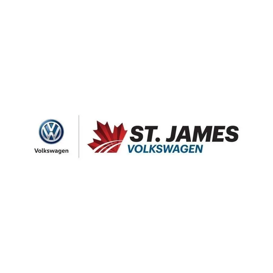 The logo for st. james volkswagen has a maple leaf on it.