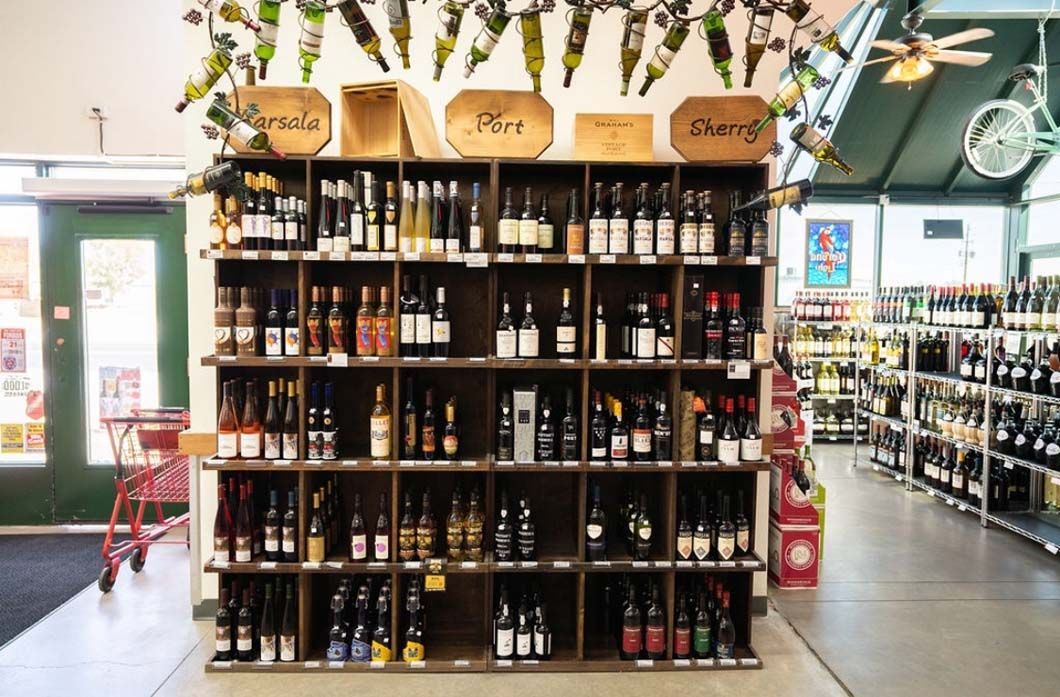 A store filled with lots of wine bottles on shelves