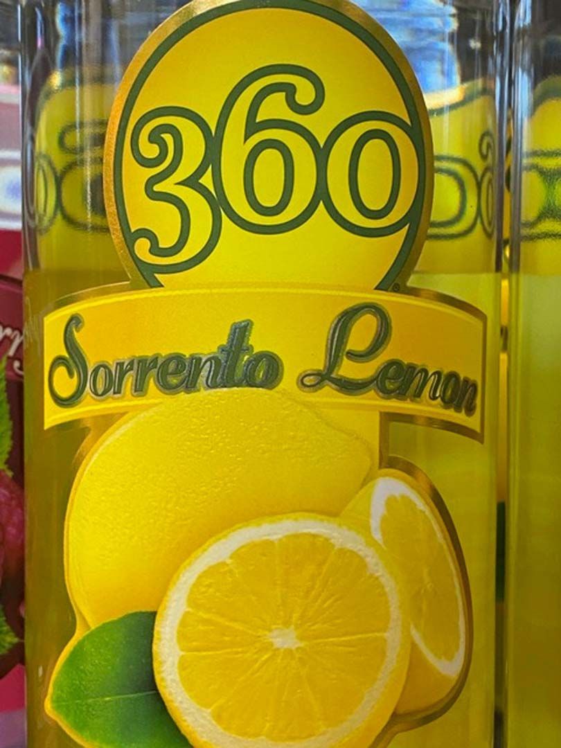 A bottle of 360 sorrento lemon sits on a table