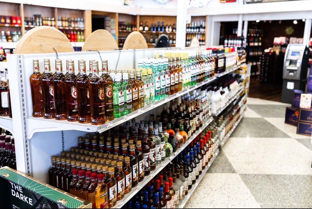 A liquor store filled with lots of bottles of alcohol.