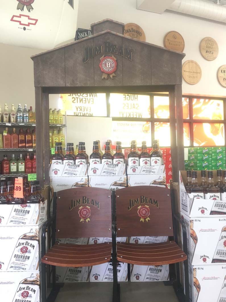 A store filled with lots of bottles and chairs