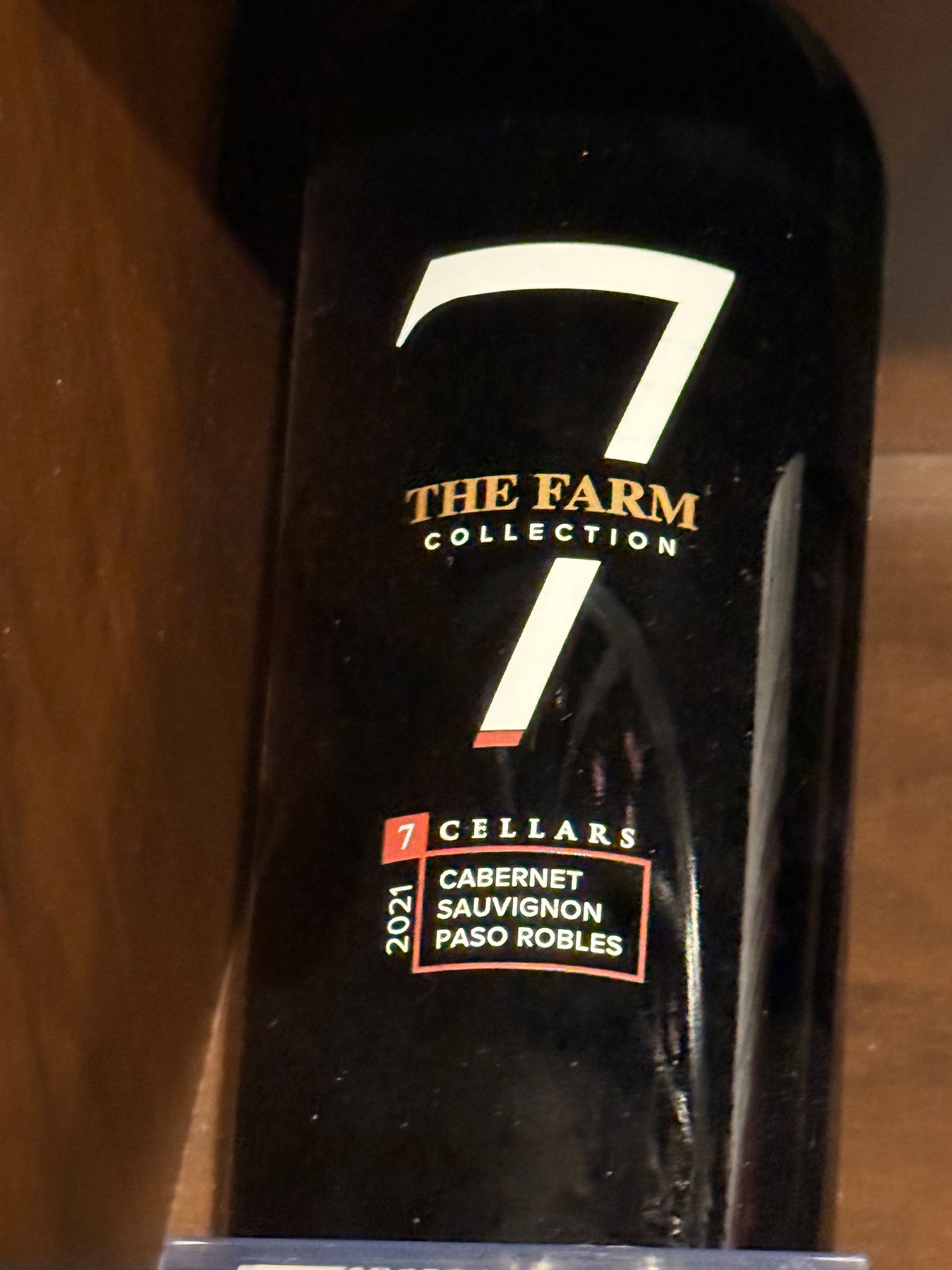 Bottle of Boen Pinot Noir wine. Label is gold, red, and cream.