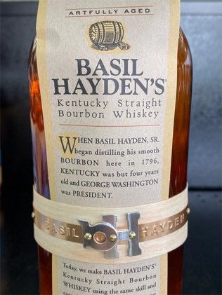 A bottle of basil hayden 's kentucky straight bourbon whiskey