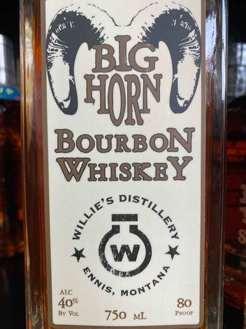 A bottle of big horn bourbon whiskey from willie 's distillery