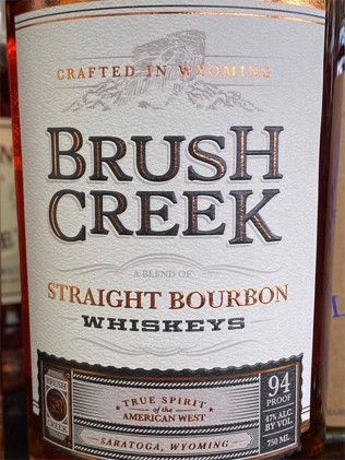 A bottle of brush creek straight bourbon whiskey