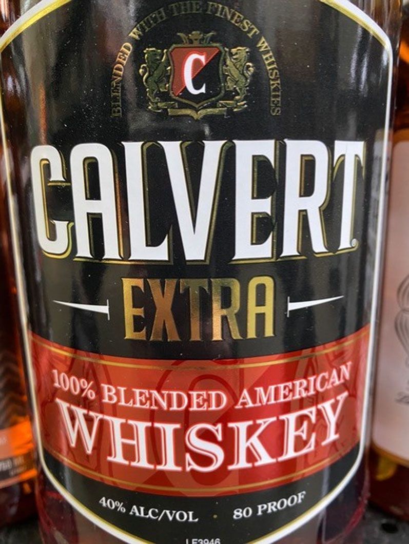 A bottle of calvert extra blended american whiskey