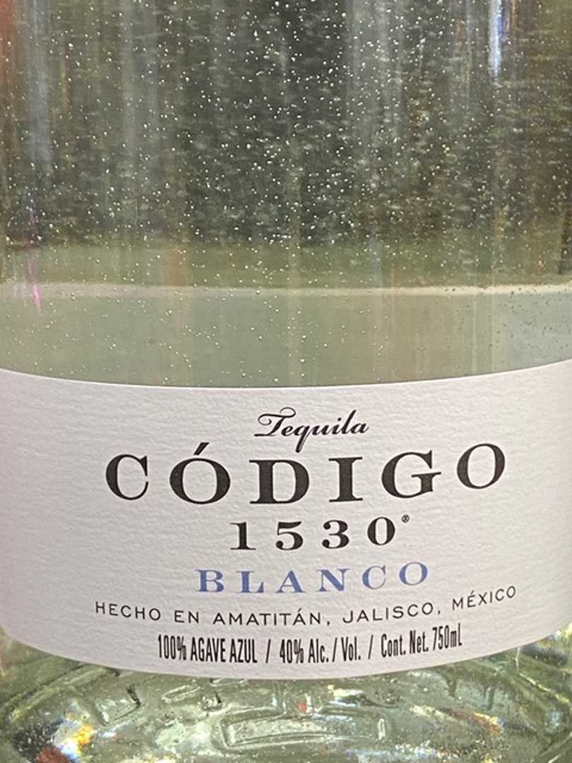 A close up of the label of a bottle of tequila.