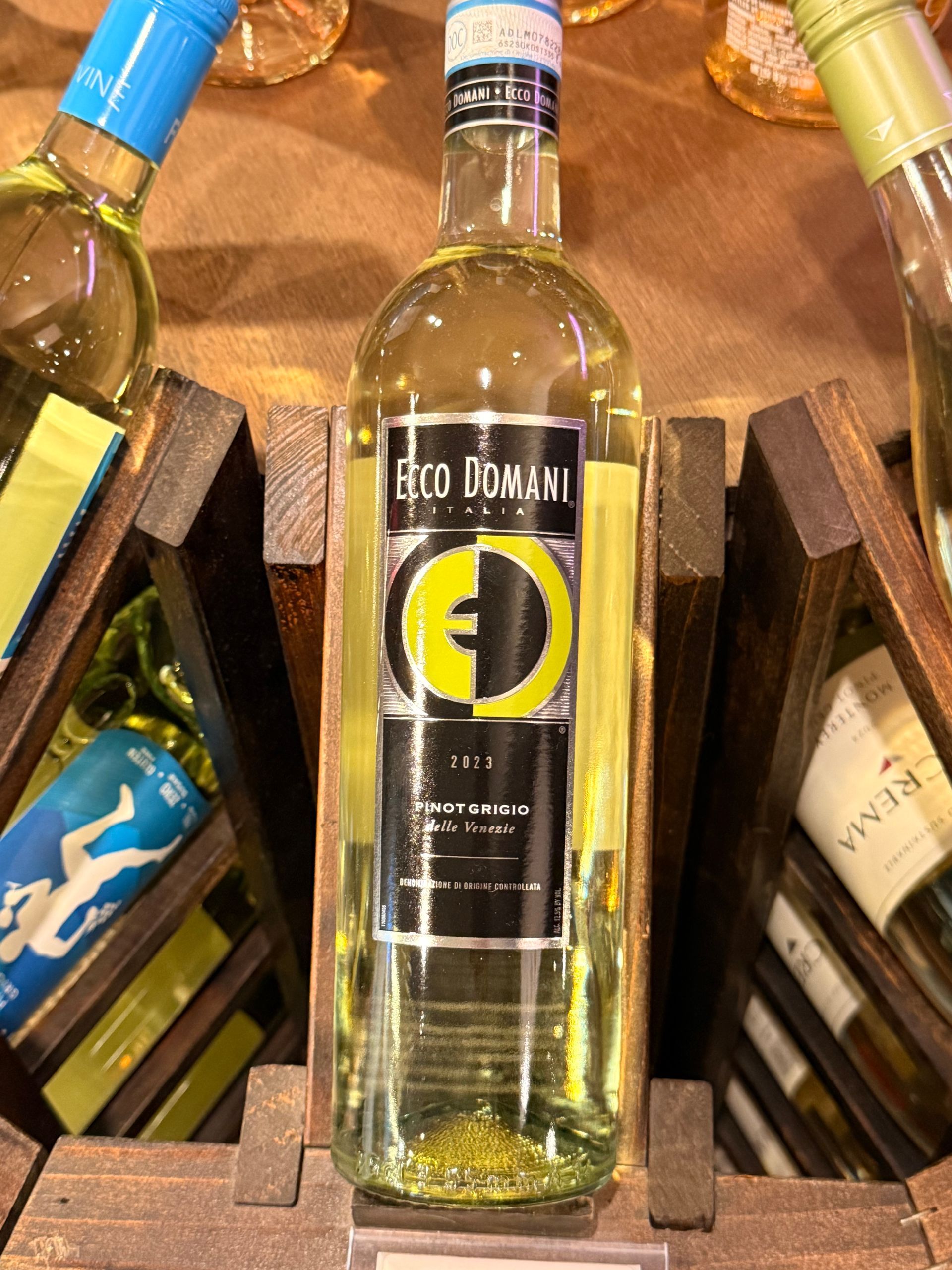 Bottle of Yealands Sauvignon Blanc from Marlborough, New Zealand, 2022, in wooden rack.