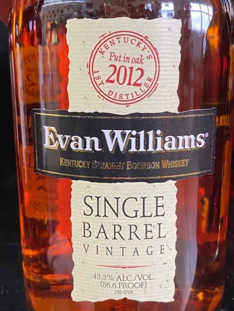 A bottle of evan williams single barrel vintage kentucky straight bourbon whiskey