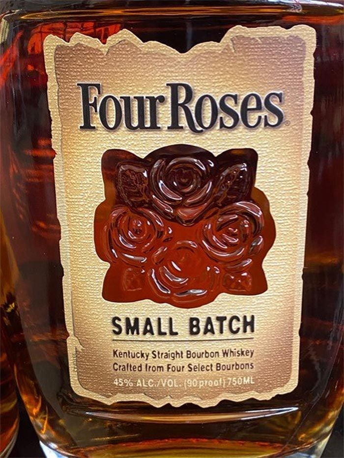 A bottle of four roses small batch kentucky straight bourbon whiskey.