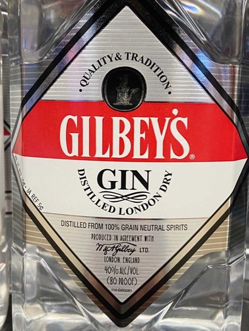 A close up of a bottle of gilbey 's gin