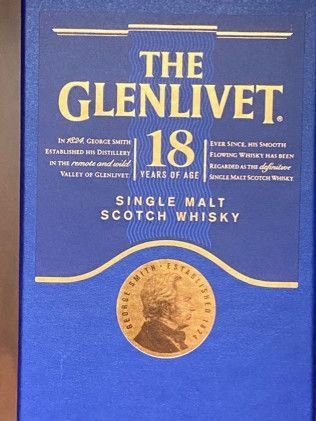 A blue box of the glenlivet single malt scotch whisky