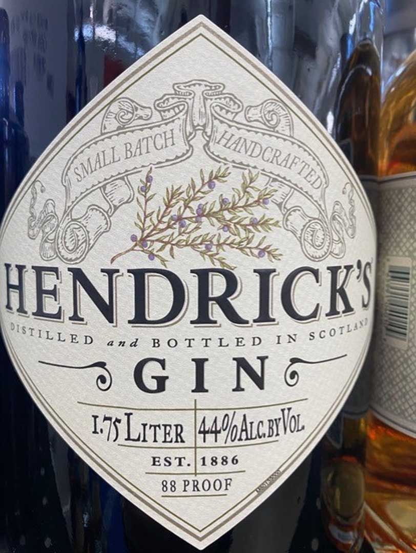 A bottle of hendrick 's gin with a white label