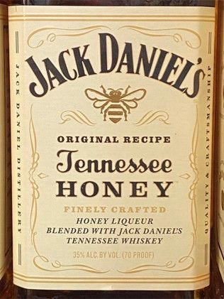 A bottle of jack daniel 's tennessee honey whiskey