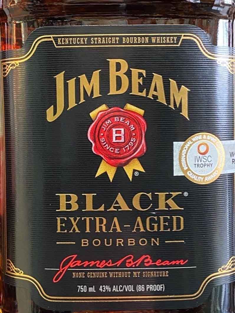A bottle of jim beam black extra aged bourbon