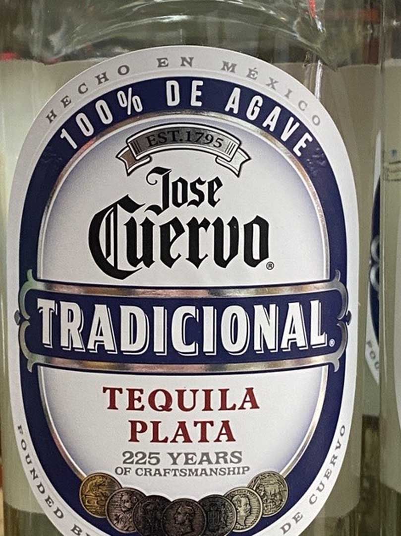 A bottle of jose cuervo traditional tequila plata