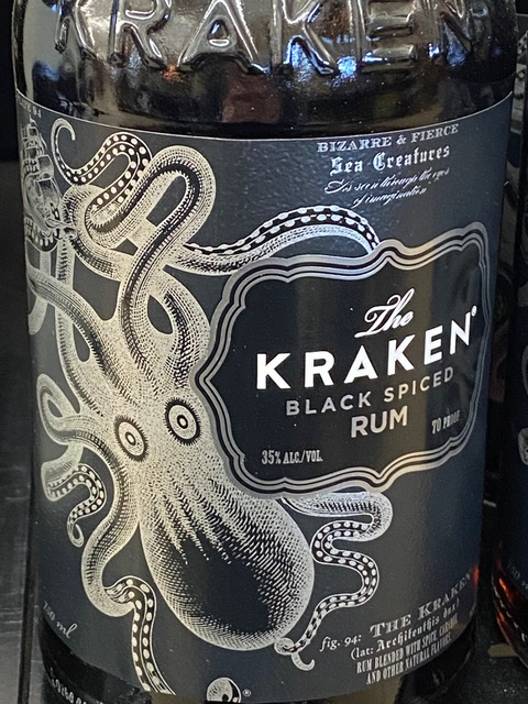 A bottle of kraken black spiced rum with an octopus on the label