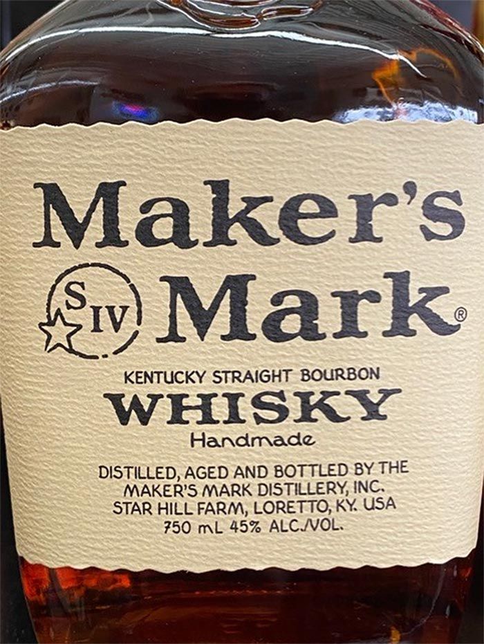 A bottle of maker 's mark kentucky straight bourbon whisky