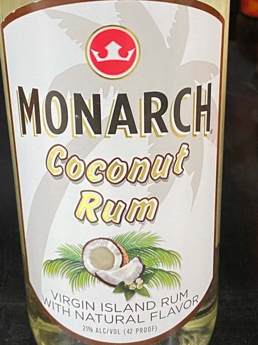 A bottle of monarch coconut rum virgin island rum with natural flavor