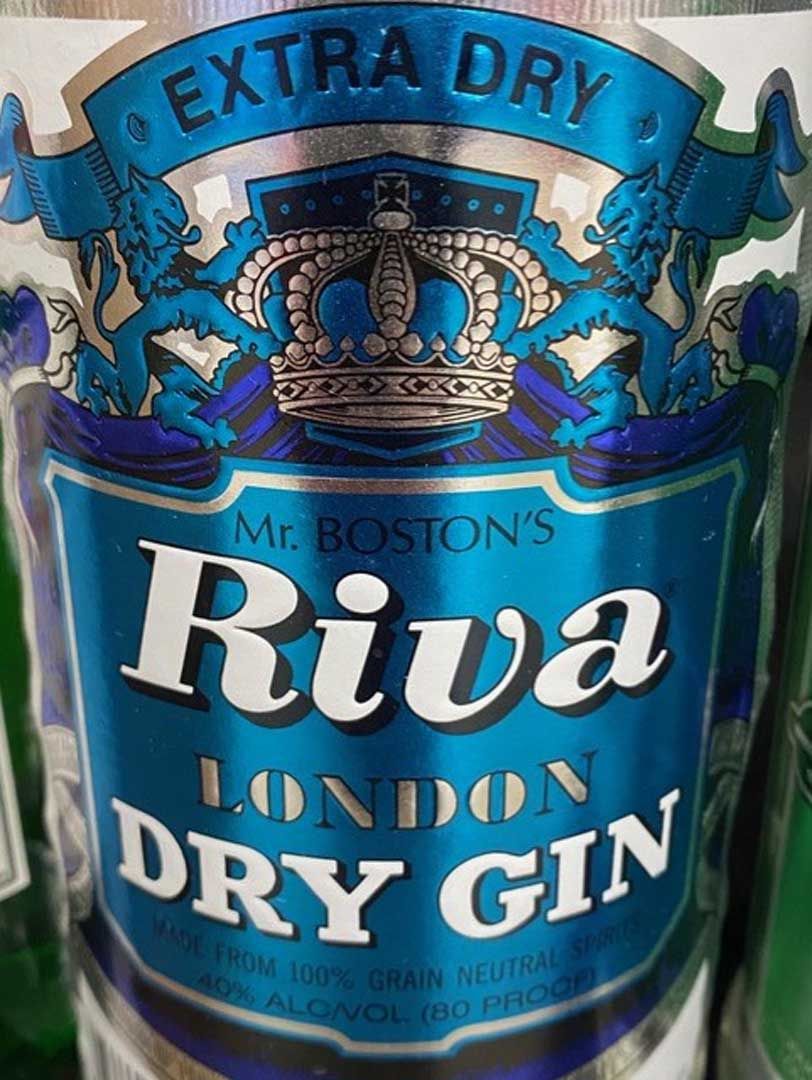A bottle of extra dry riva london dry gin