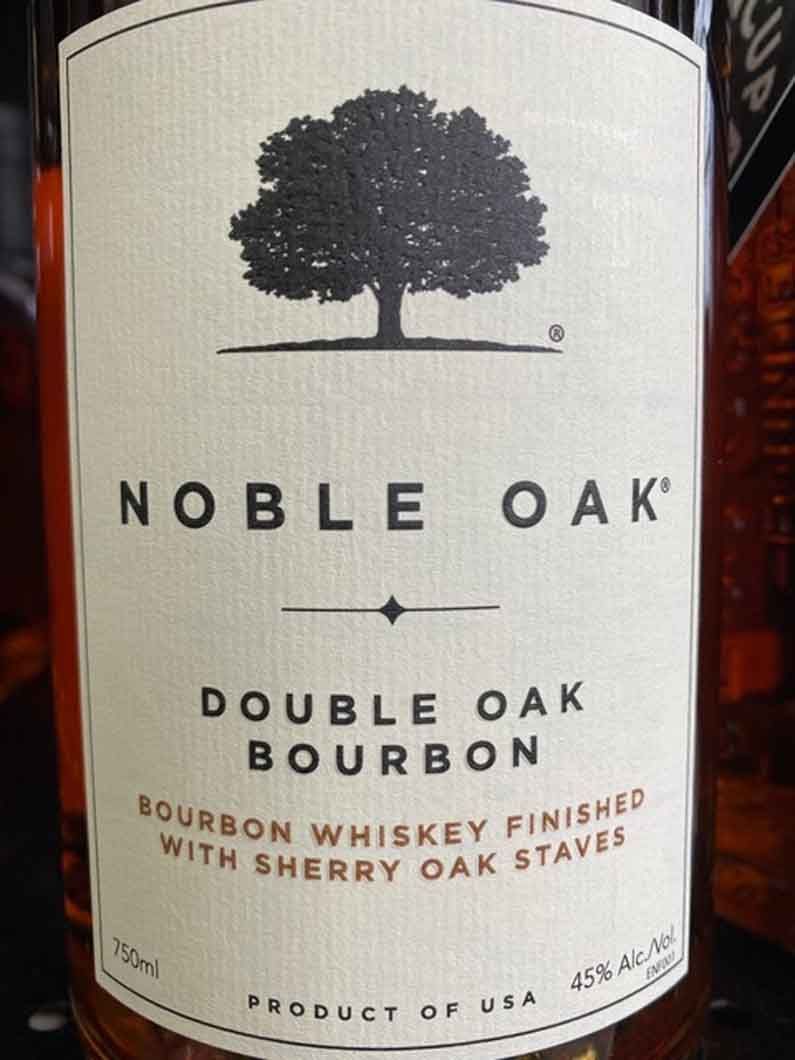 A bottle of noble oak double oak bourbon