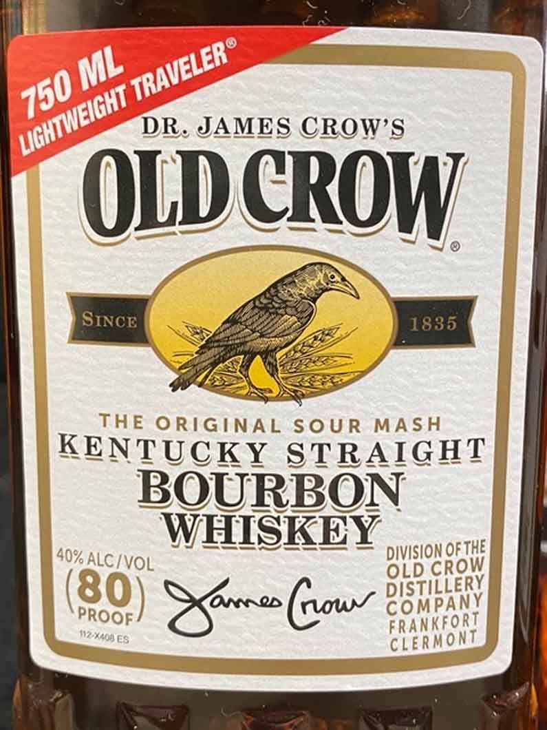 A bottle of old crow kentucky straight bourbon whiskey