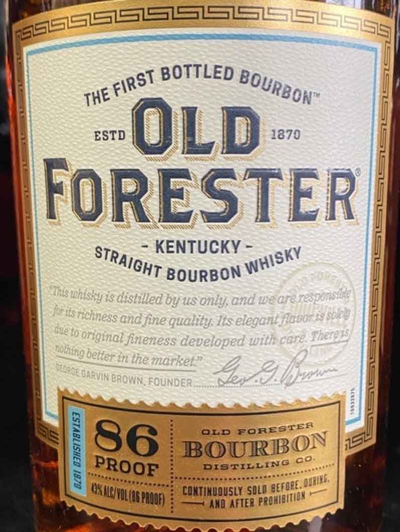 A bottle of old forester kentucky straight bourbon whisky