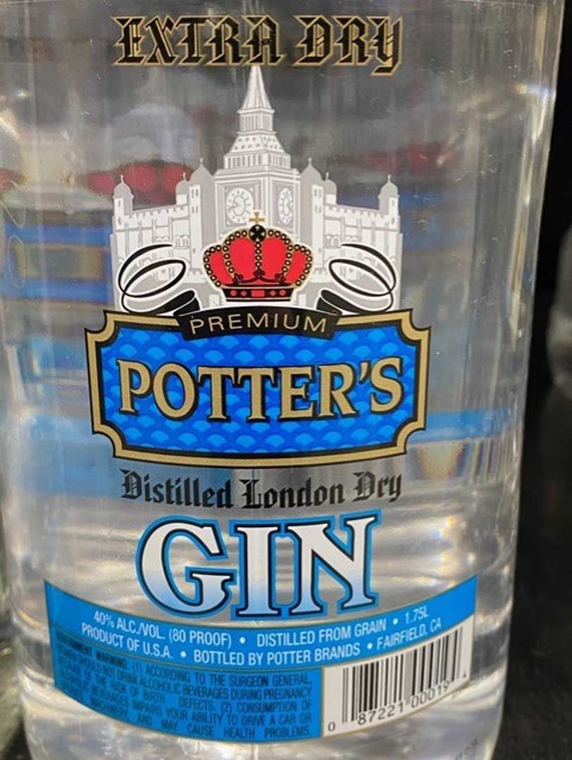 A bottle of potter 's distilled london dry gin