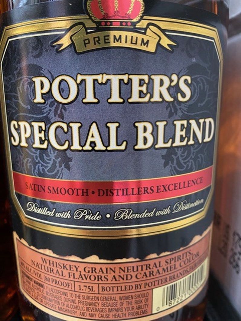 A close up of a bottle of potter 's special blend