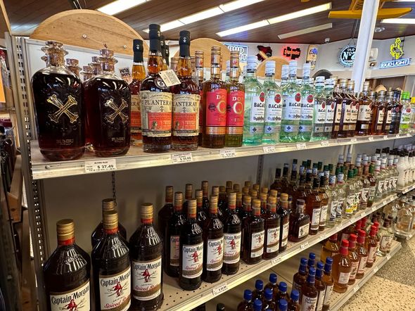 A liquor store filled with lots of bottles of liquor.