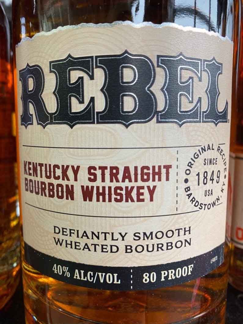 A bottle of rebel kentucky straight bourbon whiskey