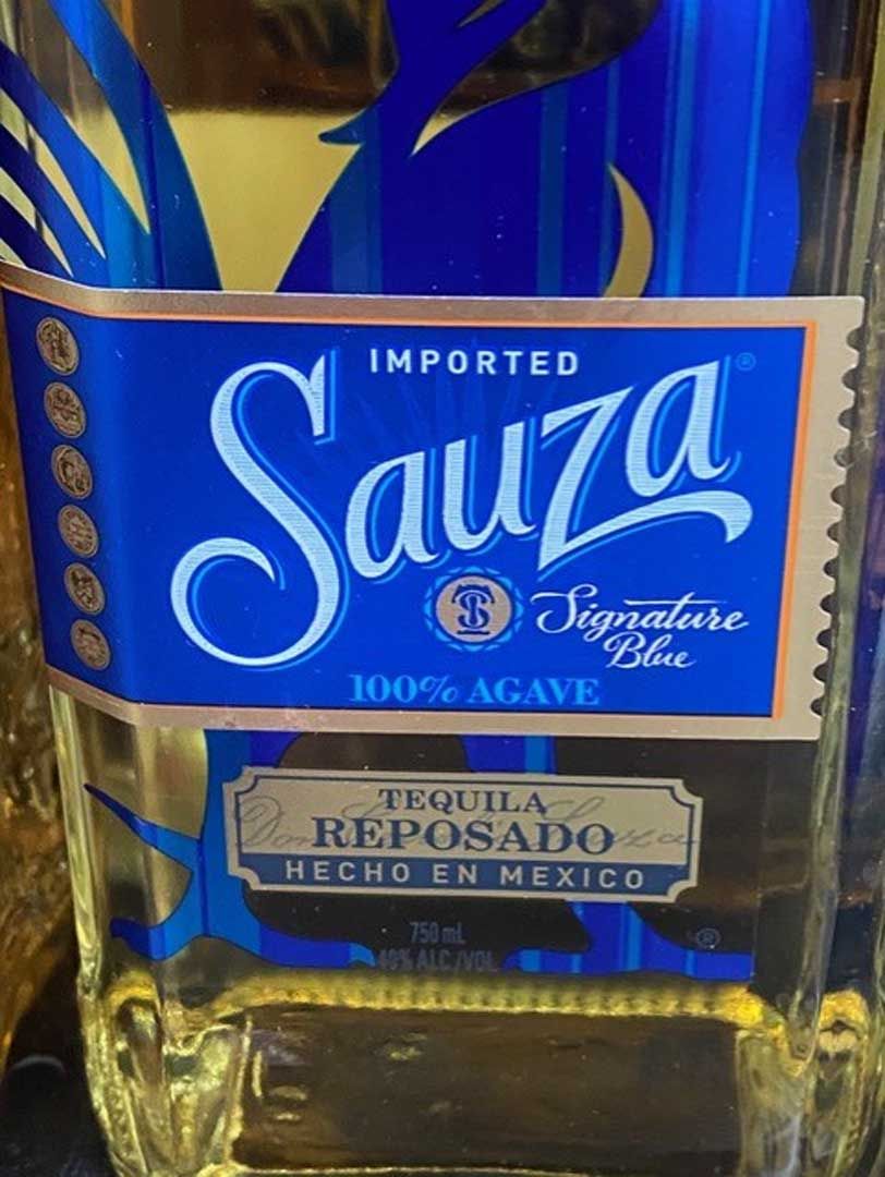 A bottle of sauza tequila reposado from mexico
